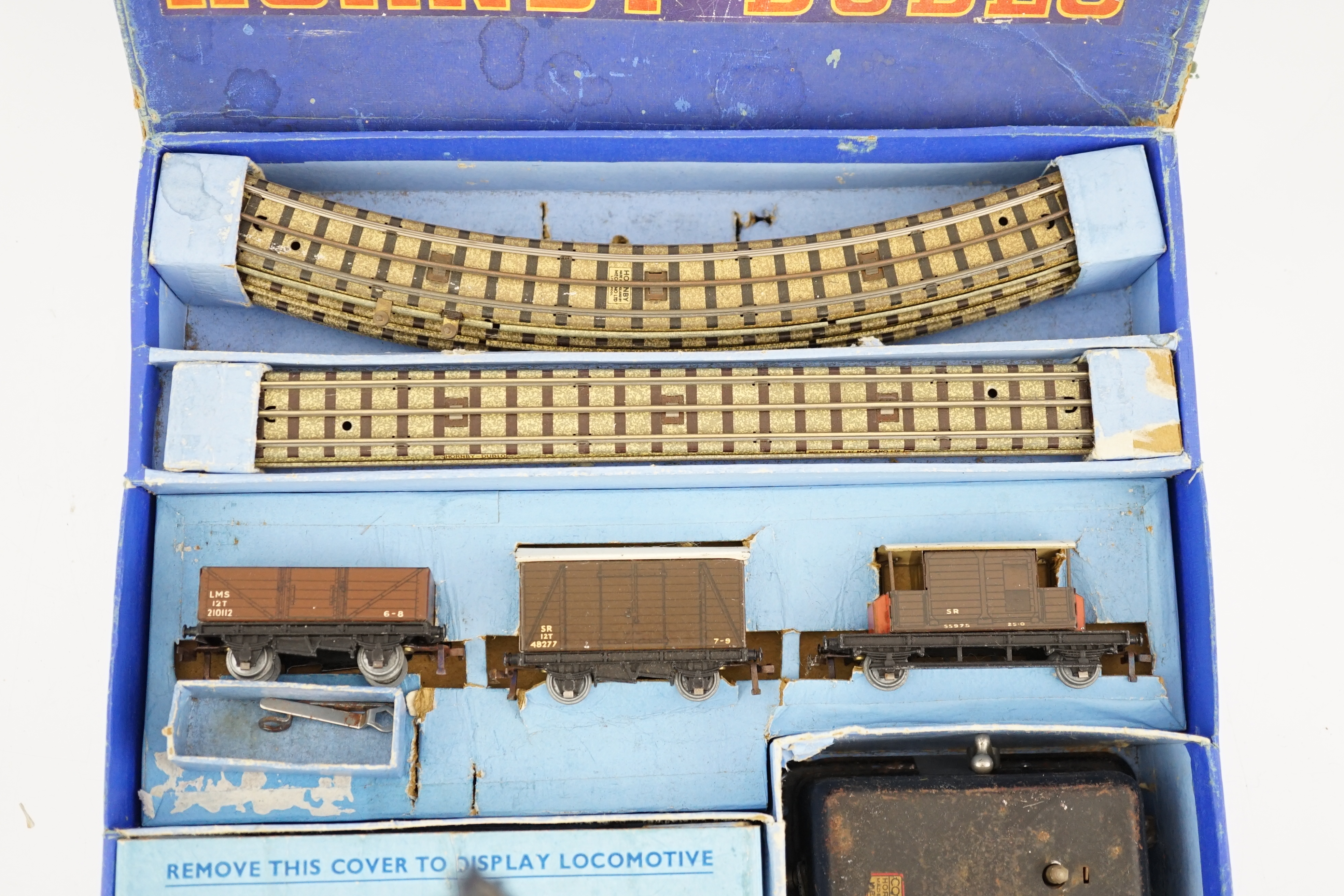 A boxed Hornby Dublo EDG7 Southern Railway Tank Goods Set, comprising of an SR Class N2 0-6-2T locomotive, 2594, for 3-rail running, two Southern freight wagons and an associated LMS open wagon, track sections, etc.